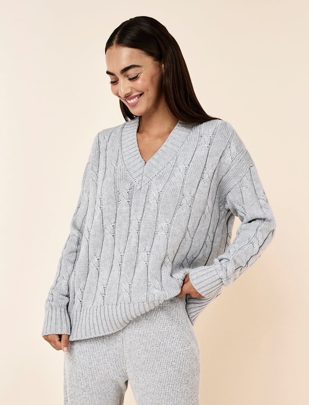 Tash wearing the Cotton Cashmere Cable V-Neck Jumper
[model: Tash wears size S |  Height: 173m
/ 5’8” | Bust: 81cm | Waist: 66cm| Hips: 94cm]