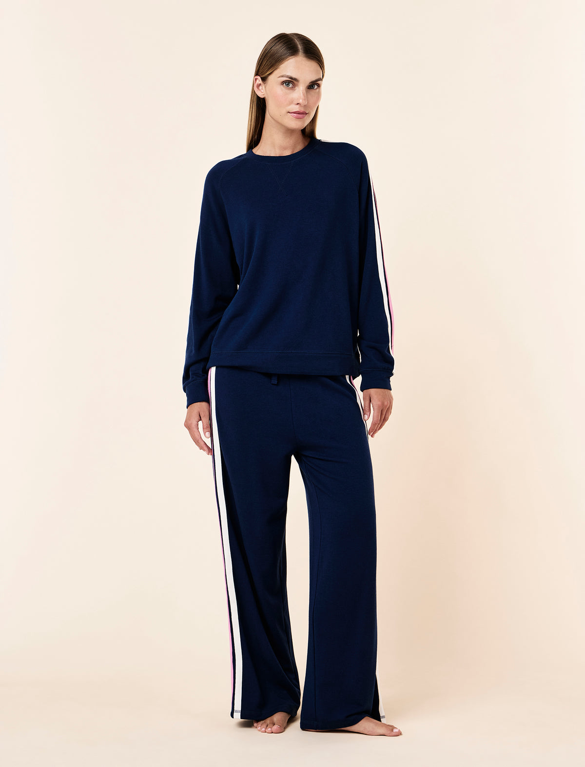 Lilly wearing the Cosy Kate Stripe Long Sleeve Top & Wide Leg Pant Set
[model: Lilly wears size S |  Height: 170cm
/ 5’7” | Bust: 75cm | Waist: 58cm | Hips: 89cm]